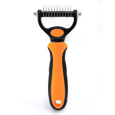 China Viable Running Pet Hair Remove Stainless Steel TPR Handle Pet Cleaning Brush For Dog And Cat Double Sided Cutter Head Strongly Clean for sale