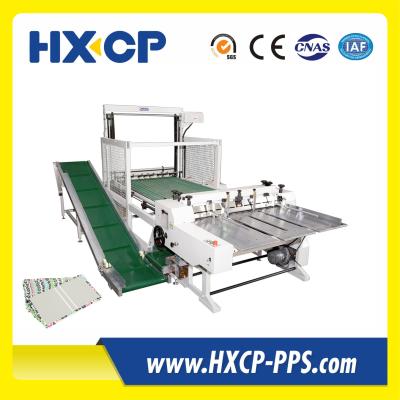 China HX1200 Automatic Paper Board Slitter Notebook Making Machine Multi-Functional Integration for Streamlined Notebook Making for sale