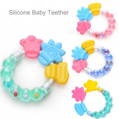 China Soft food grade silicone baby toy baby teether bpa free baby teether bracelet for sale