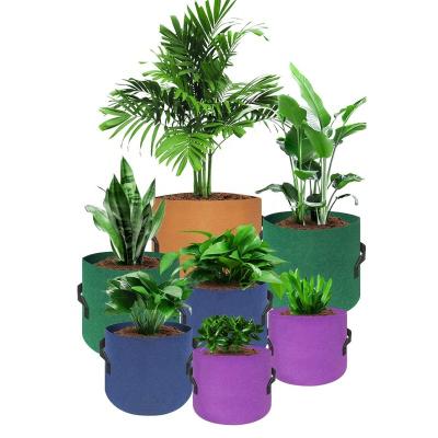 China Custom Felt Eco-Friendly Felt Breathable Cloth Garden Planter Pots Greenhouse Vegetable 5 Pack 25 Gallon Grow Bags for sale