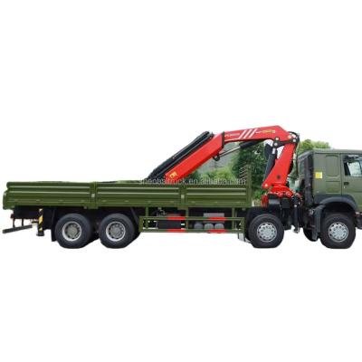 China TRUCK CRANE Sinotruck HOWO 8x4 12 Wheels Truck With 25 Ton Knuckle Mounted Boom Cranes For Sale for sale