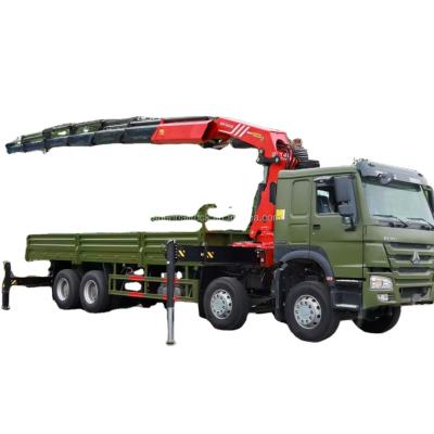 China TRUCK CRANE High quality China Sinotruck HOWO 8x4 loader truck with 20 ton knuckle boom cranes mounted on sale for sale