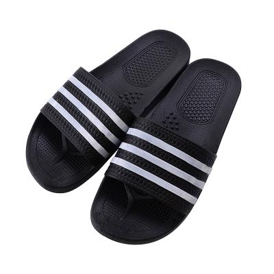 China New fashion trend fashion summer three version bathroom plastic men's hower word strend one bar leisure home slippers for sale