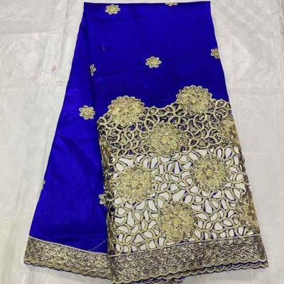 China AN7005 Fashion Georges White Nigerian Lace Last Sustainable African Lace Fabrics For Making Dress for sale