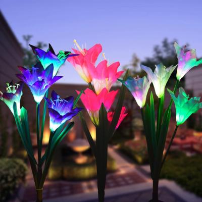 China LANDSCAPE Patio Backyard Multi Color Changing 4pcs Lily Flowers Solar Stake Lights Outdoor Decoration for sale