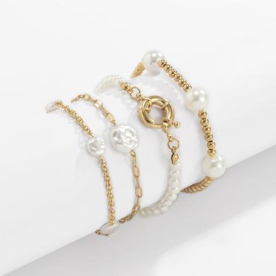 China FASHIONABLE Personality Imitation Pearl Irregular Beaded Bracelet Set Holiday Punk Folding Bracelet Female for sale