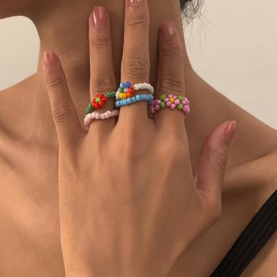 China Vintage style small rice bead flower ring contrast small colorful fresh color woven daisy 5 ring set for sale