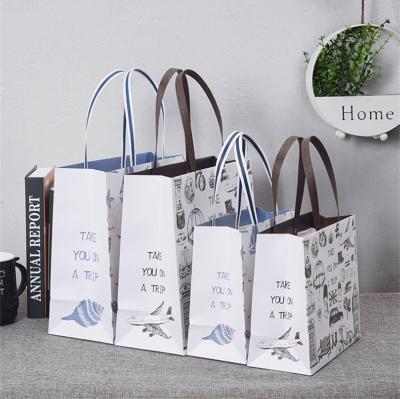 China Recycled materials suitable for any occasion high-grade handbags, custom logo handheld paper bags, a variety of color gift bags for sale