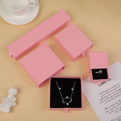 China Modern Stylish Hot Selling Custom Stamping Logo Ring Case Jewelery Box Pendant Earring Velvet Boxes Simple Jewelry Packaging Box for sale