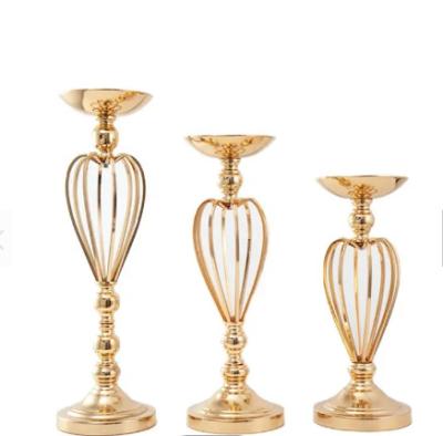 China Classic Metal Vintage Candle Holder Ceramic Candlestick Three Size Flower Stand For Table Centerpiece Wedding Decorations for sale