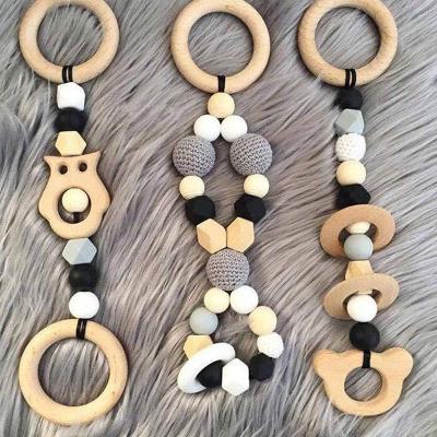 China 6 Months Antique Imitation Beech Wooden Baby Making AccessoriesPlay Toys Teether Rattle Wooden Ring for sale