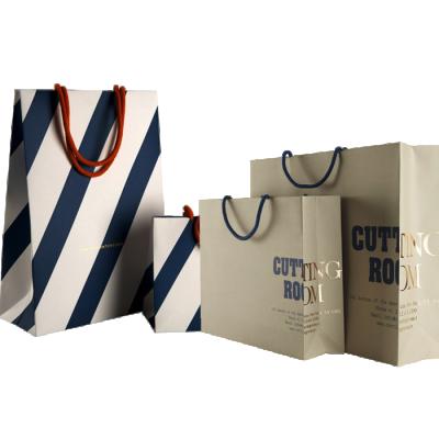 China Recycled 2021 Trending Products Customized Fashion All-match Square Paper Bags Printed Paper Bags for sale