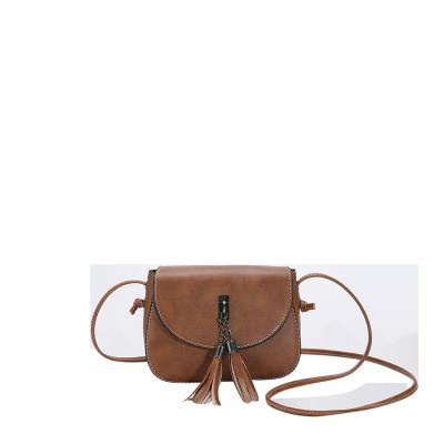 China Latest Fashion Women PU Leather Soft Bag Portable Popular Saddle Body Sling Crossbody Bag Tassel Belt Bags 2022 for sale