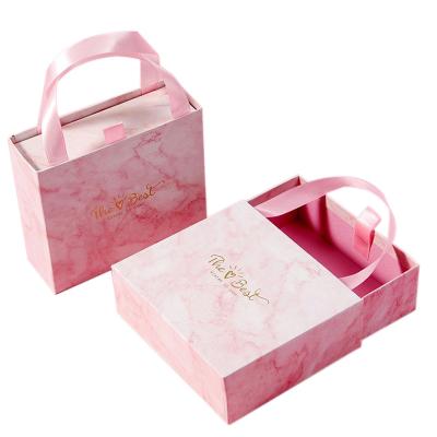 China Reused Materials Printing Candy Box Pink Wedding Gift Drawer Portable Marble Box With Handle for sale