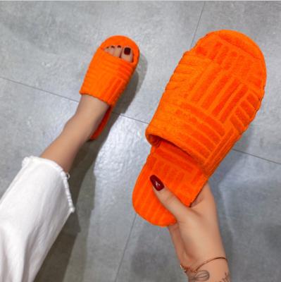 China Damping 2023 Winter Platform Towel Cotton Slippers Women Warm Embossed Fur Home Slippers for sale