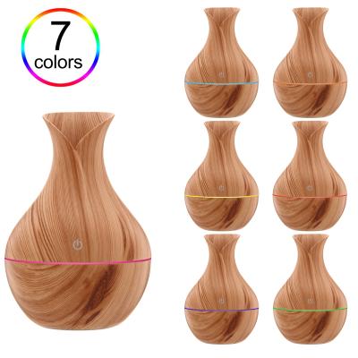 China 7 Colors New Night Light 2021 Air Humidifier Ultrasonic Led Mini Vase Shape Diffuser Humidifier Wooden Grain Cool-mist Wood Grain Humidifier for sale