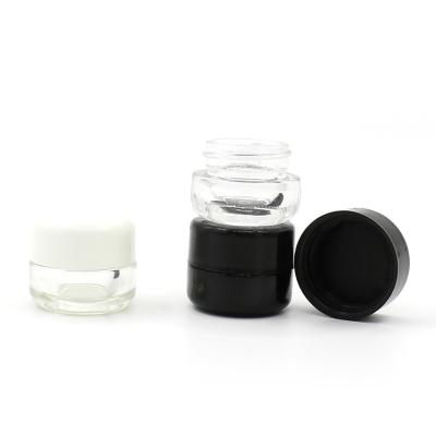 China Wholesale Cosmetic 5ML Mini Size Round Essential Oil Black Lid And White Lid Glass Eye Cream Jar for sale