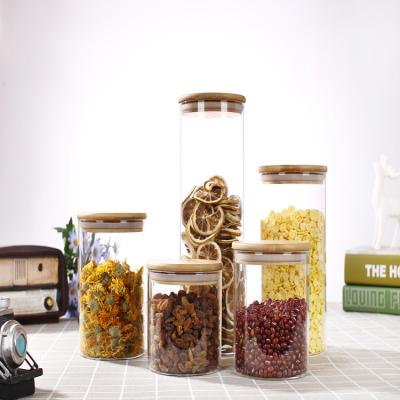 China Large Food Wide Mouth High Borosilicate Sealed Clear Food Storage Tea Kitchen Use Glass Jar With Bamboo Lid for sale