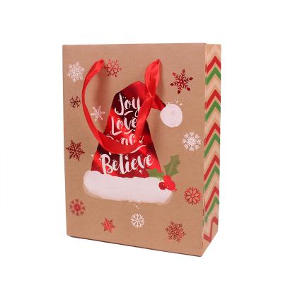 China Large Recyclable Kraft Paper Christmas Gift Bags For Present Christmas Snacks Clothing Box Packing Christmas Bag for sale