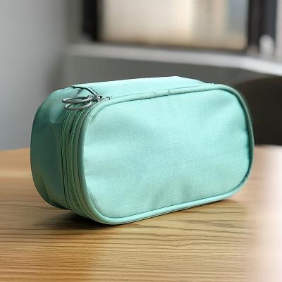 China Viable Makeup Bolsa Zipper Toiletries Double Stand Toiletries With Kiwi Pocket Travel Handheld Storage Cosmetic Bag for sale