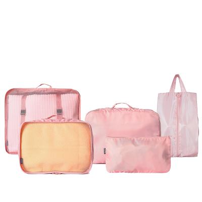 China Hot Selling Sustainable Receive Clothes Fashion Polyester Seven-piece Luggage Travel Storage Kit Bag Set For Women for sale