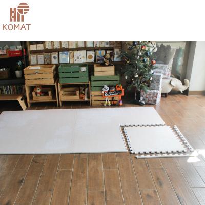 China Flower Leaf Art Foam Floor Tiles Interlocking Washable Geometric Creamy Play Mat for sale