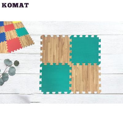 China Indoor Non-Toxic Colorful Interlocking Wood Plastic Double Flooring Mat for sale