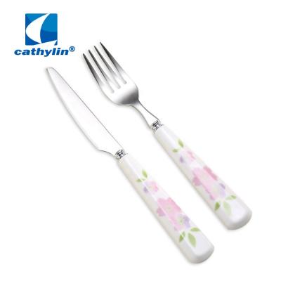 China Cathylin Disposable Flora Handle Stainless Steel Dinner 18-10 Dessert Silver Spoon Ceramic Cutlery Flatware Set for sale