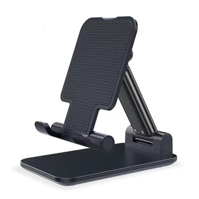 China Universal Adjustable Foldable Stand Holder Foldable Mobile Phone Table Tablet Aluminum Alloy Phone Desk Holder for sale