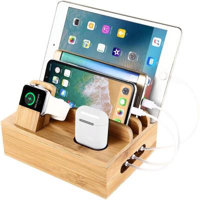 China Flexible Bamboo Charging Pad Storage And Finishing Mobile Phone Dock Stand Holder Bamboo Charger Station Bracket for sale