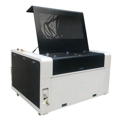 China Laser Engraving Portable CO2 Laser Cutter Engraving Cutting Machine For MDF And PVC for sale