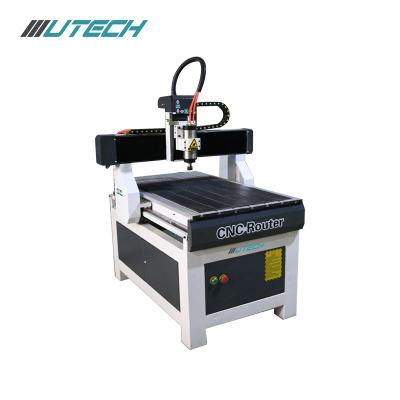 China Alumunim Wood Acrylic PVC Engraving Cutting Mini CNC Router For 9012 1212 Cutting CNC Router Aluminum 6090 Wood Milling Machine for sale