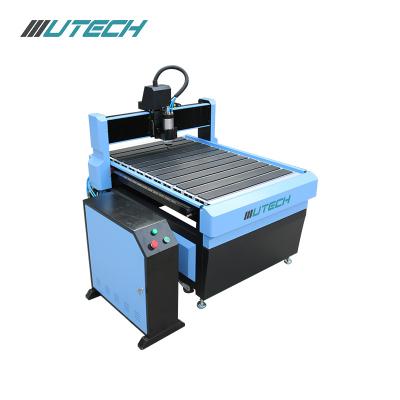 China Wood Acrylic PVC Alumunim Engraving Cutting Advertising CNC Router 6090 9012 For Solidwood, MDF, Aluminum, Actylic Cutting And Engraving for sale