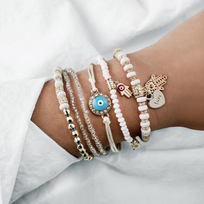 China Vintage Ethnic Heart Eye Adjustable Hand Pendant Layered Bracelets Set For Women Beads String Bracelet Anklets for sale