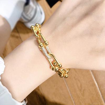 China Hiphop Explosion Style European And American Style Micro-inlaid Zirconium Diamond U Hook Bracelet CIO Ladies Thick Horseshoe Jewelry for sale