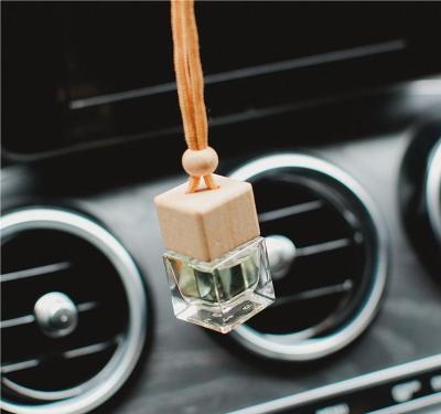 China Transparent Cube Aromatherapy Car DK 10ml Glass Bottle Viable In Place Hanging Auto Air Freshener Fragrance Diffuser Pendant Wholesale for sale