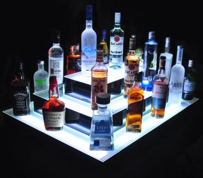 China BSCI Eco-friendly Factory Umoment LED 3 Tire Island Acrylic Liquor Display Stands With Bottle Display for sale