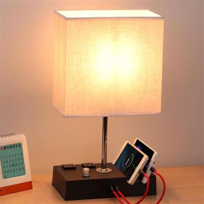 China 2021 New 2USB Traditional Retro Table Lamp Mobile Phone Holder Bedroom Bedside Wooden Quick-Fill Lamp for sale