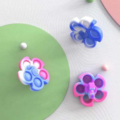 China New Food Grade Autism Silicone Bubble Push Noise Spinner Rotating Glowing Ring Eco-friendly Material Sensory Spinner Stirrer for sale