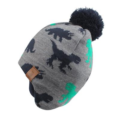 China Winter Dinosaur Pattern Baby COMMON Hat Beanie Kids Knitted Hats 100% Acrylic Unisex With Pom Pom Boys Girls for sale