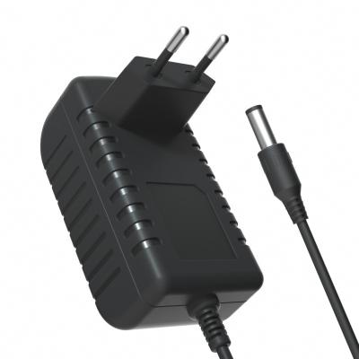 China Wholesale 200-240V PVC Adapter PVC Cell Phone Shell European Black And White AC 12V 1A DC 12W Power Fast Charging Charger for sale