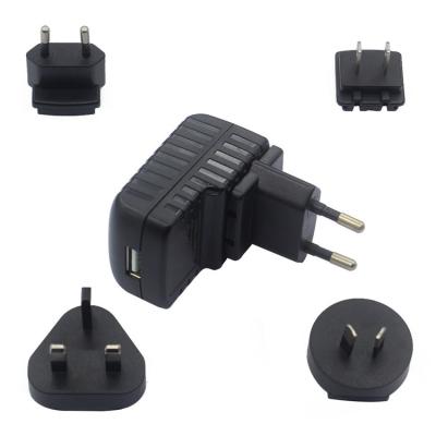 China LED light. DC 5v 2a Plug UK Power Adapter Interchangeable AU EU EU Electrical Appliances Power Supply Adapter For Electronic Products for sale