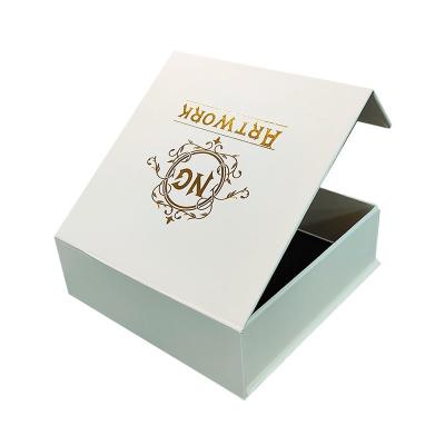 China Embossed Magnetic Packaging Box UV Hot Stamping Rigid Paperboard Boxes Packaging for sale