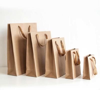 China Custom Order Accepted Logo Bulk Shipping Coffee Brown Kraft Paper Bag with Handle for sale