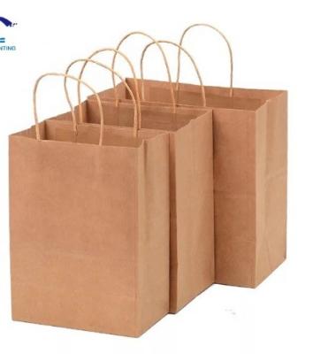 China Brown Kraft Paper Shopping Bags Offset Printing Apparel Paper Bag Customized Logo for sale