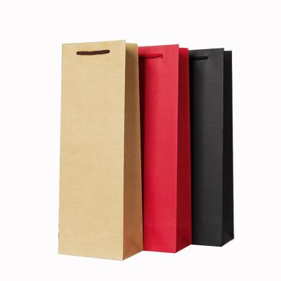 China Varnished Hot Stamping Kraft Paper Wine Bags With Handles Beverage Packaging Solution for sale