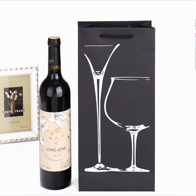 Cina Imballaggio singolo Bottiglia di vino Imballaggio sacchetti di carta nera con logo personalizzato e foglio caldo in vendita