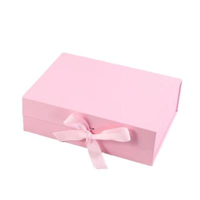 China Custom Logo Size Luxury Magnetic Flip Wig Cosmetic Packaging Box Gift Box With Ribbon Magnetic Closure for sale