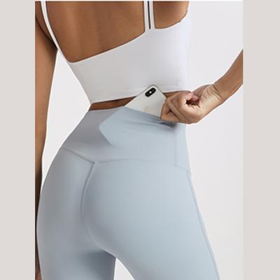 China Naked Yoga Women Pocket Breathable Tight Hip High Waist Fitness Lifting Running Pants for sale