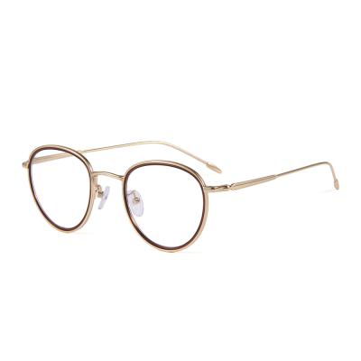 China Latest Trendy Glass Frames For Girls Wholesale China Fashion Glass Metal Optical Frame Model New for sale